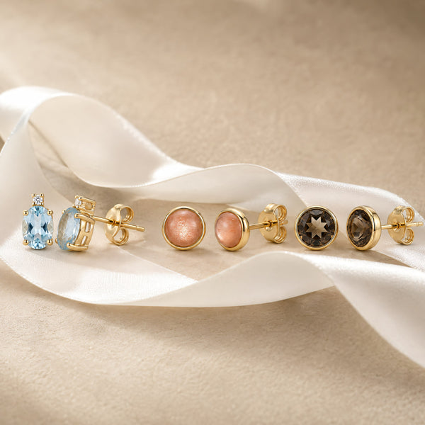 Gold stud earrings