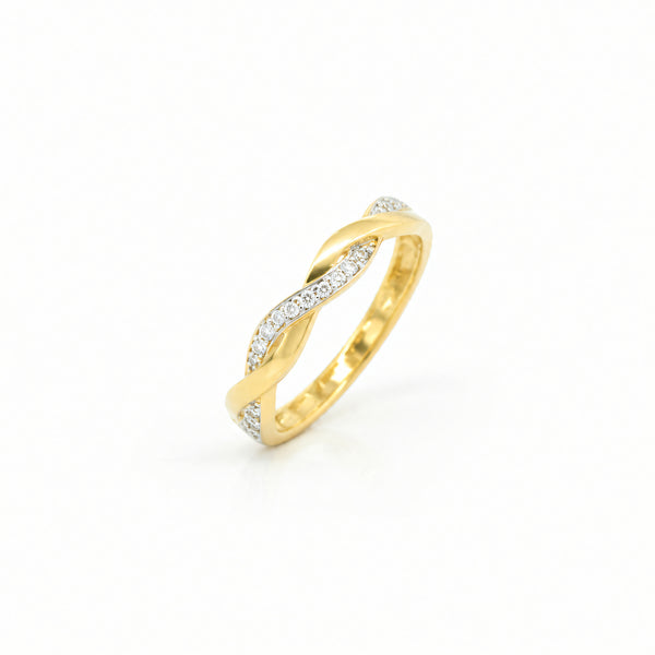 Anillo de oro amarillo de 585 con circonitas y diseño trenzado