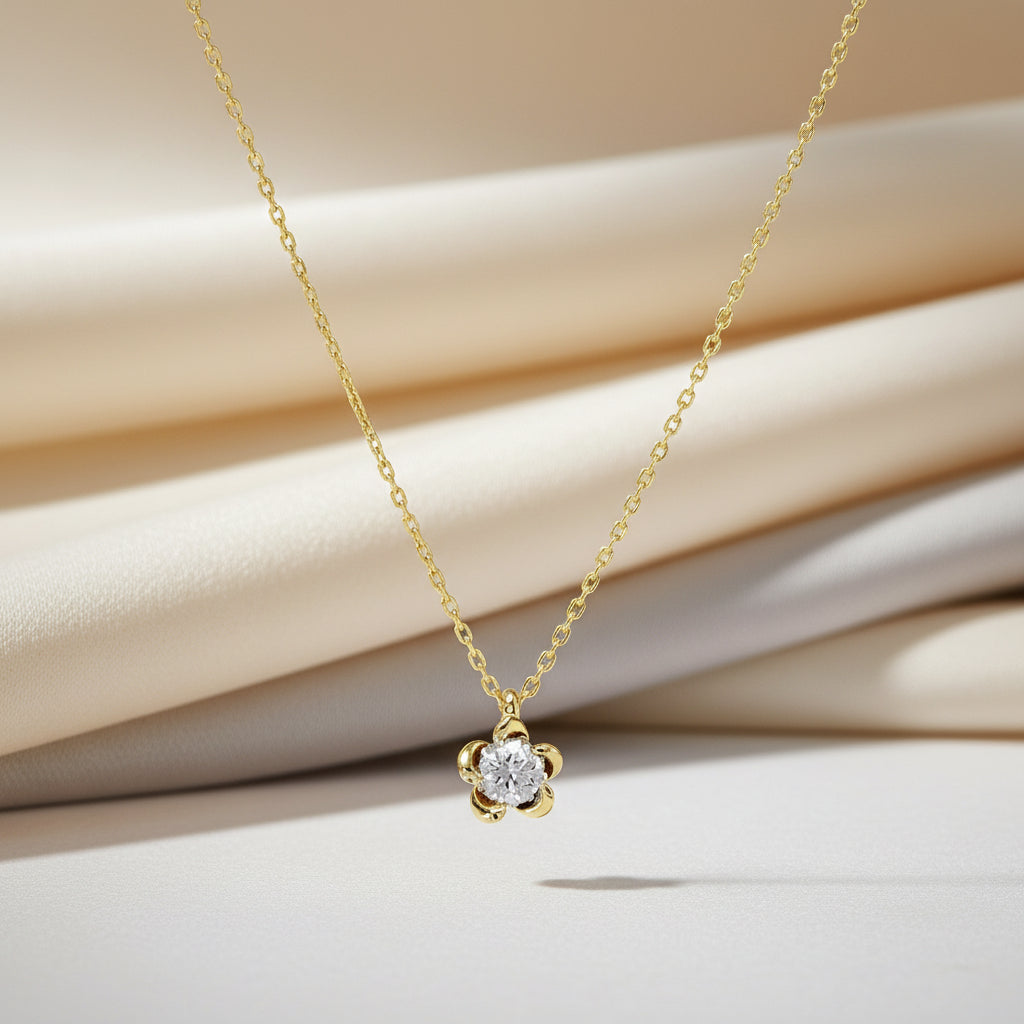 Kette mit Brillant-Anhänger in Blütenform aus 14 Karat Gold