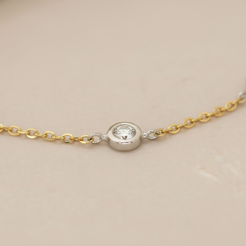 Armband 585 Bicolor Zirkonia Rundfassungen – Splendido – llevada en la muñeca
