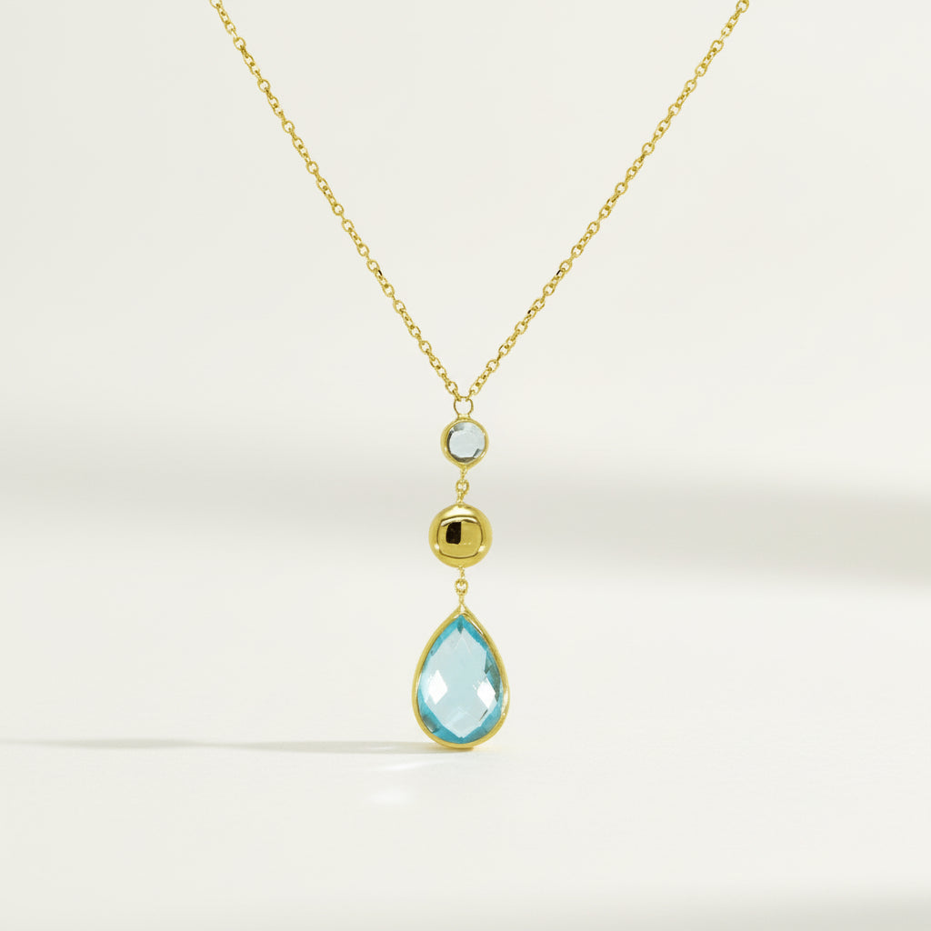 14Kt Gelbgold Halskette Mit Mehrfach Eingefassten Facettierten Topasen In Zwei Blautönen