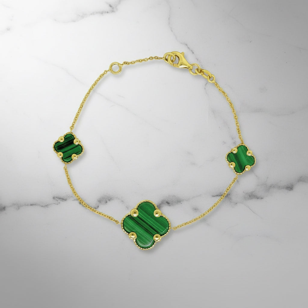 Goldarmband mit drei Malachit-Steinen in Vierpassform

