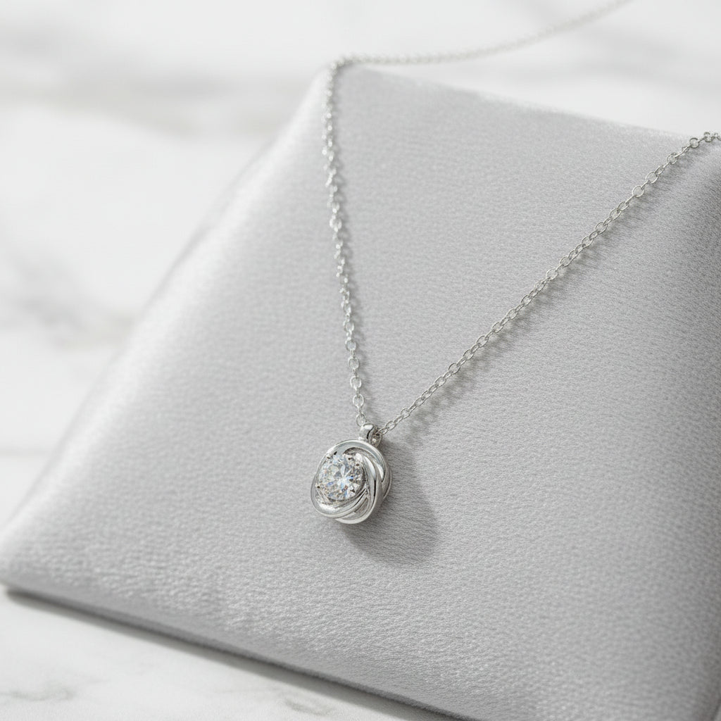 Weißgoldkette mit rundem Zirkonia in geschwungener Fassung ZOOM