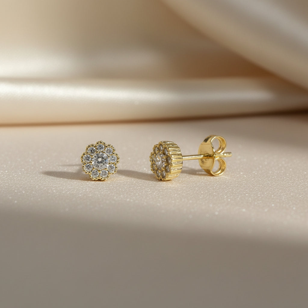 Ohrstecker in Blütenform aus Gelbgold mit Zirkonia

