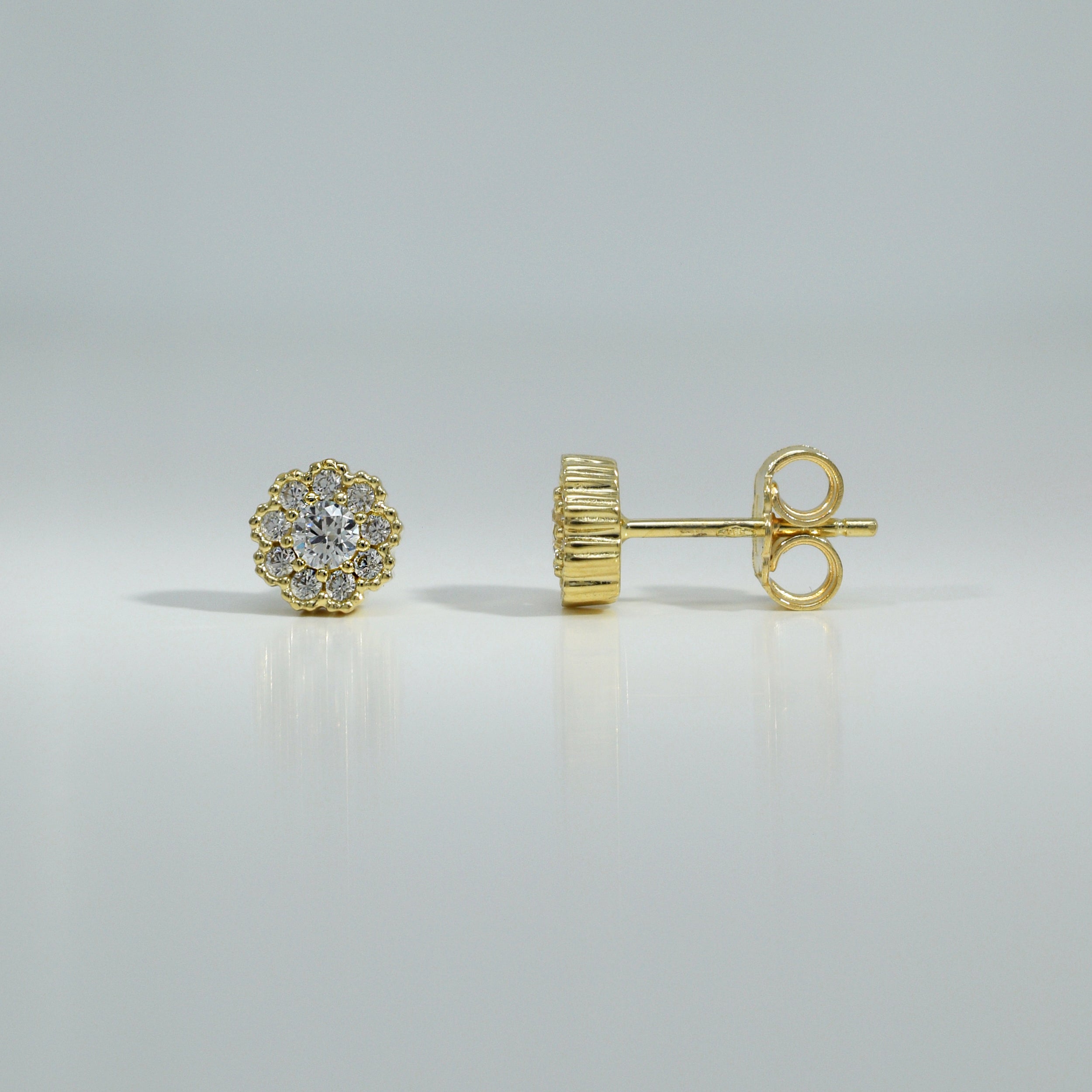 Ohrstecker in Blütenform aus Gelbgold mit Zirkonia

