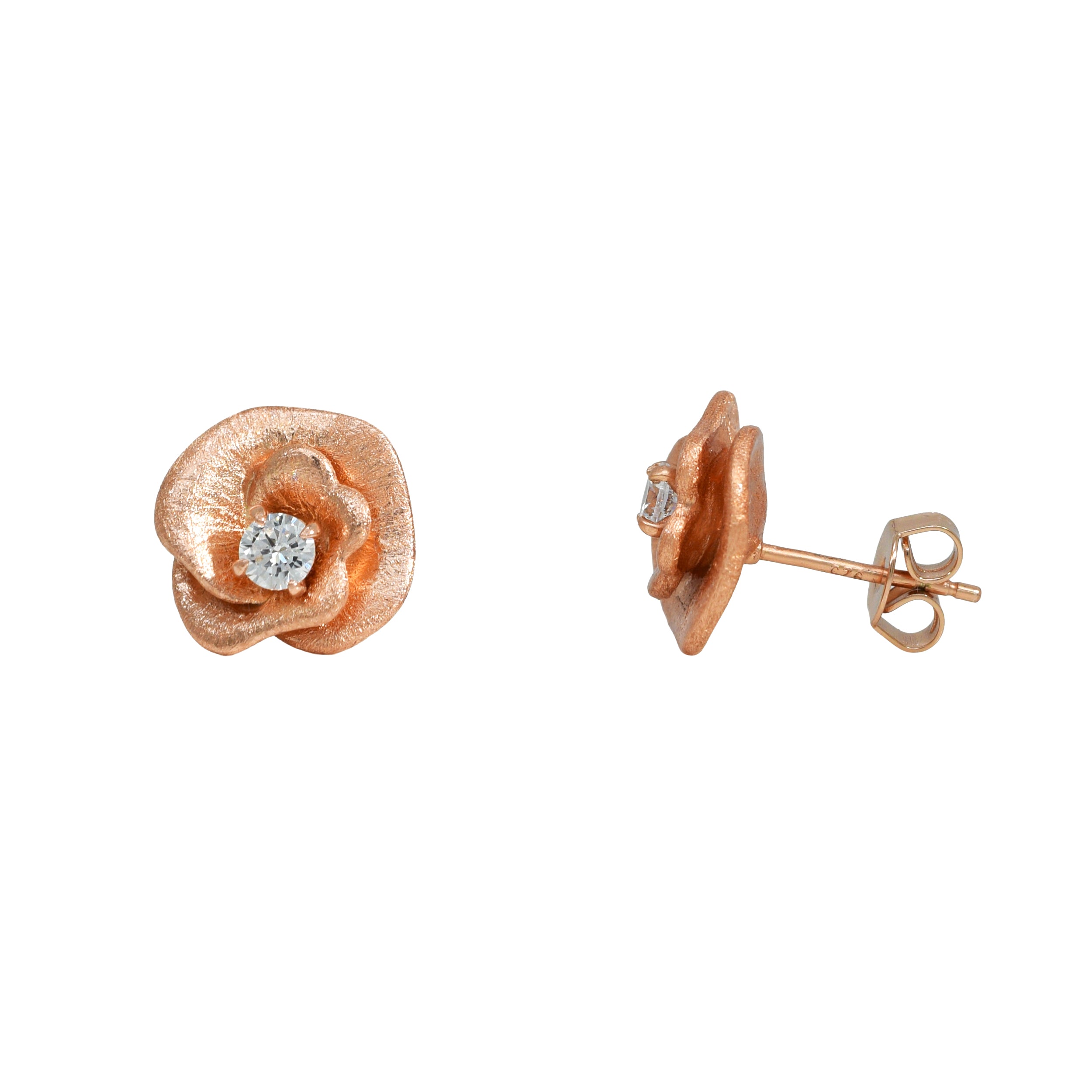 Silberne Ohrstecker in Herzform mit einem rosafarbenen Zirkonia-Stein.
